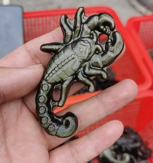 Silver obsidian scorpion carving